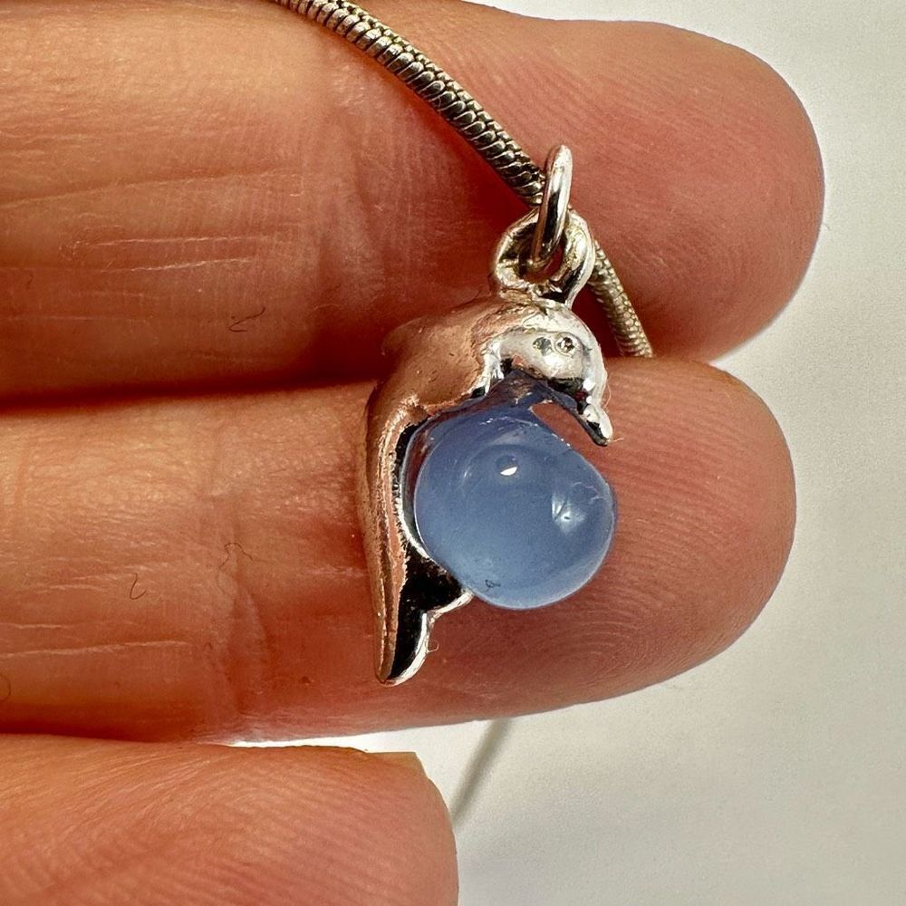 Silver tone blue cats eye dolphin pendant necklace